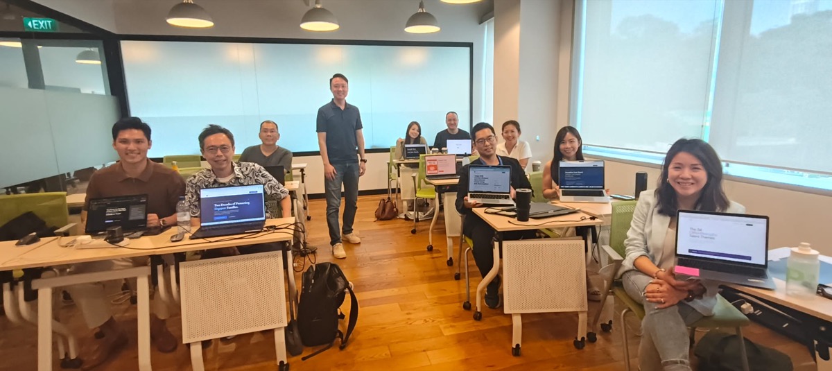 Nine students from the 16 April 2026 cohort with their live websites at the end of the day